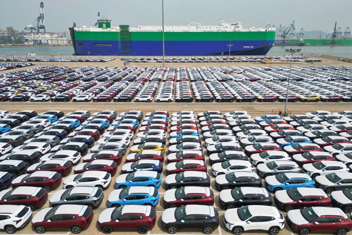 Cars await loading onto a ship for export at Yantai Port in east China’s Shangdong Province on May 9, 2023. Photo: Xinhua