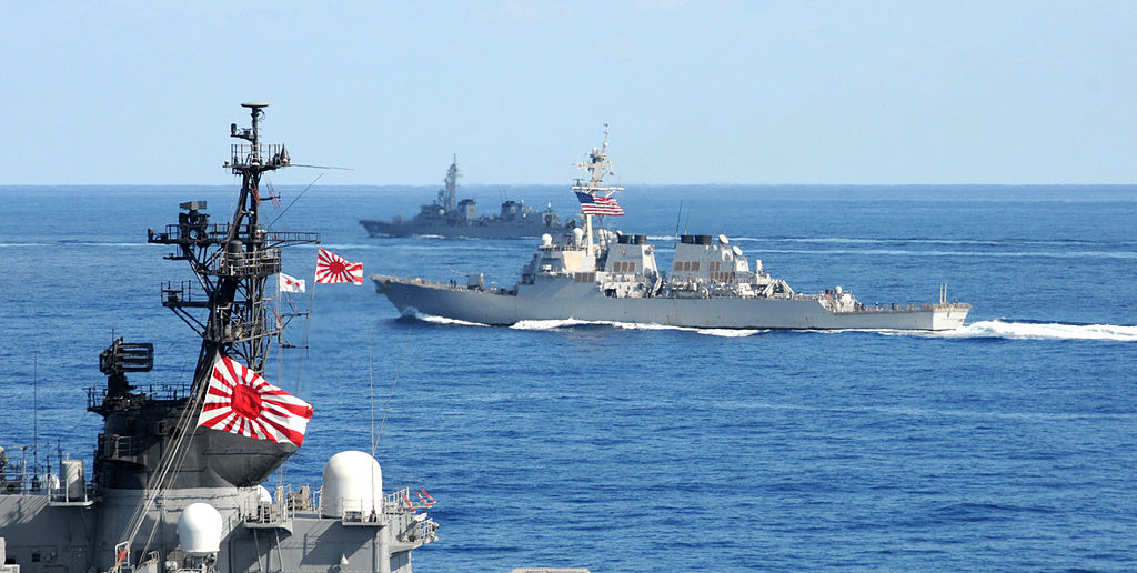 1024px-US_Navy_101210-N-7191M-031_U.S._Navy_and_Japan_Maritime_Self-Defense_Force_(JMSDF)_ships_underway_in_formation_as_part_of_a_photo_exercise_on_the_f.jpg