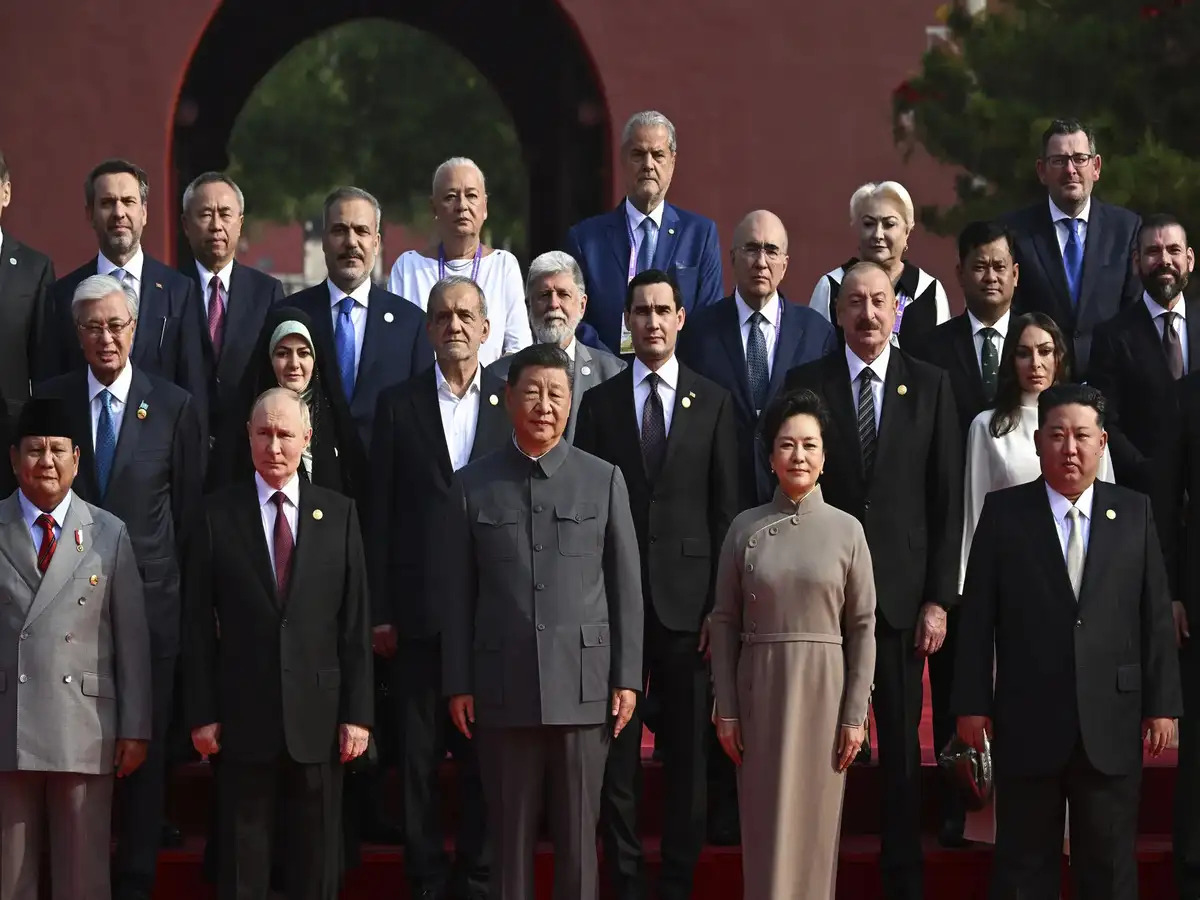 Chinese President Xi Jinping and First Lady Peng Liyuan with more than 20 world leaders in attendance at China's V-Day parade, Sept. 3, 2025.