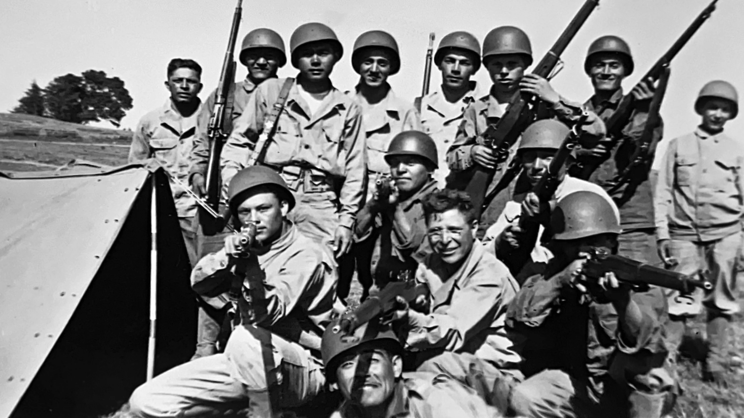 Pvt. Lui Gain Thyn, standing third from left, served during World War II with a squad of the 20th Armored Infantry Battalion. Some 20,000 Chinese Americans served their country in World War II. (File photo: Association of the United States Army)