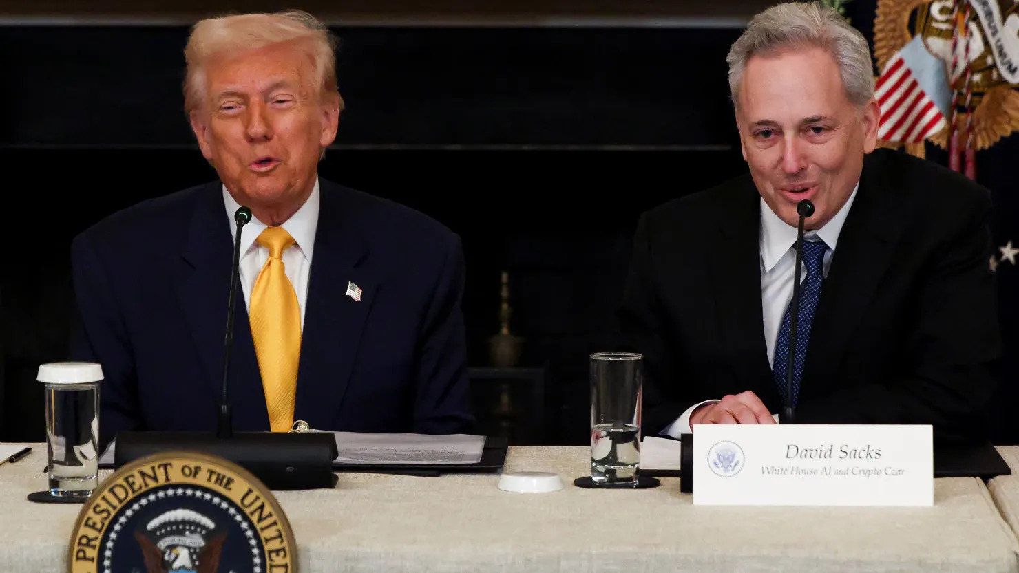U.S. President Donald Trump sits next to Crypto czar David Sacks at the White House Crypto Summit at the White House in Washington, D.C., U.S., March 7, 2025. SpaceX investor, ex-Paypal COO David Sacks is now Donald Trump’s new ‘AI and Crypto Czar‘..jpg