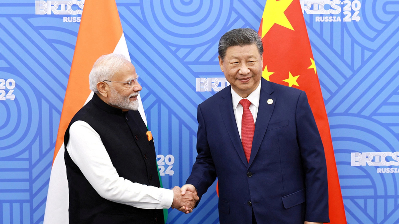 Indian Prime Minister Narendra Modi and Chinese President Xi Jinping meet on the sidelines of the BRICS summit in Kazan, Russia, October 23, 2024..jpg