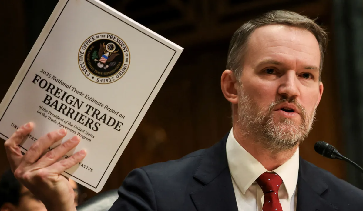 U.S. Trade Representative Jamieson Greer holds a copy of Foreign Trade Barriers as he testifies before a Senate Finance Committee hearing on President Donald Trump's trade policy on Capitol Hill in Washington, D.C., April 8, 2025.(Photo: Kevin Mohatt/Reuters)