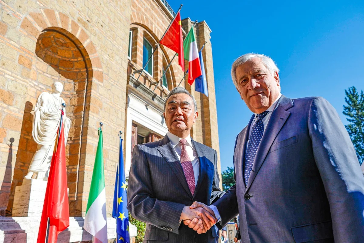 Chinese Foreign Minister Wang Yi (left) and his Italian counterpart Antonio Tajani meet in Rome on Oct 8, 2025.