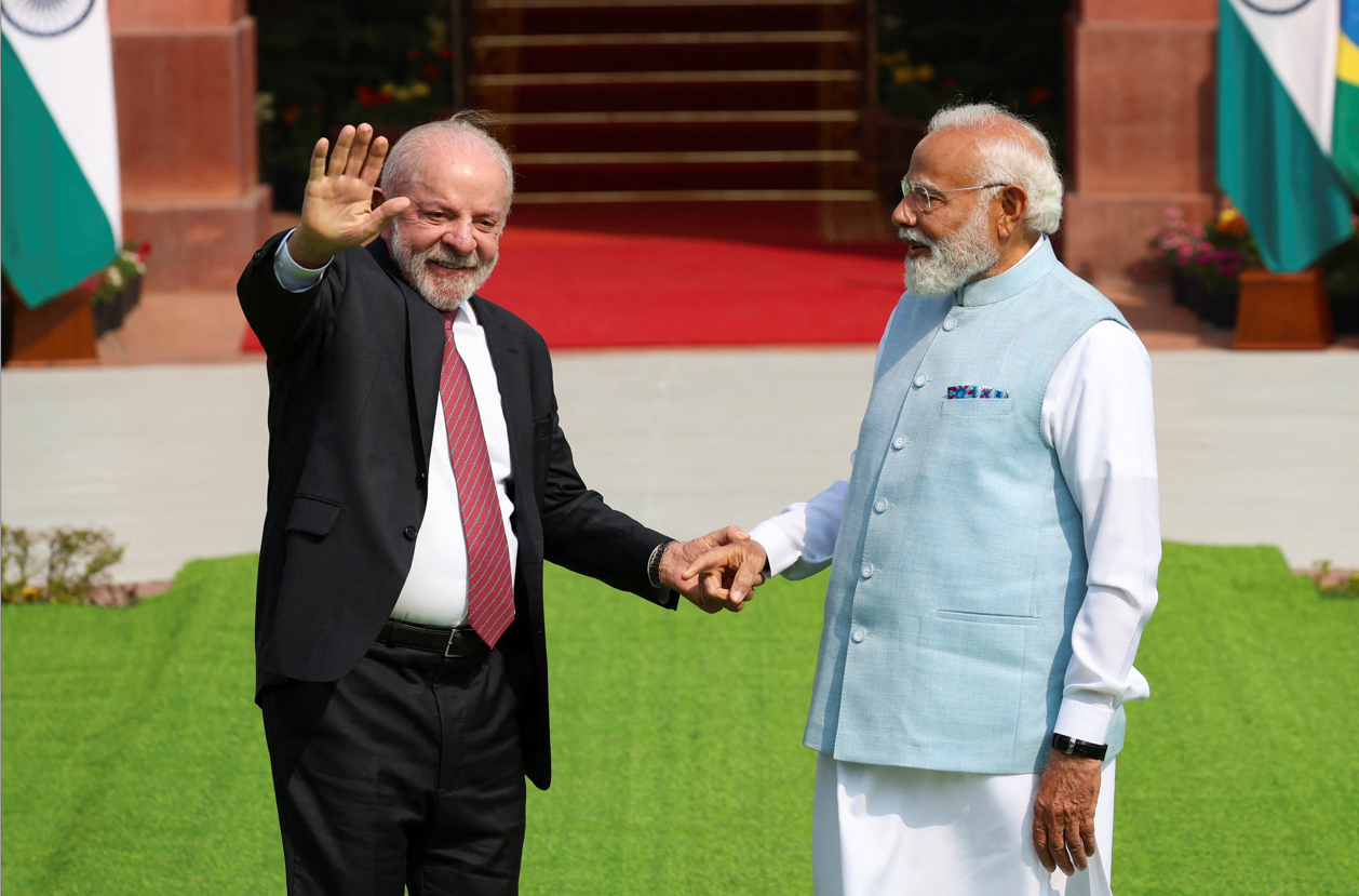 Brazilian President Luiz Inacio Lula da Silva with Prime Minister Narendra Modi after talks in New Delhi..png