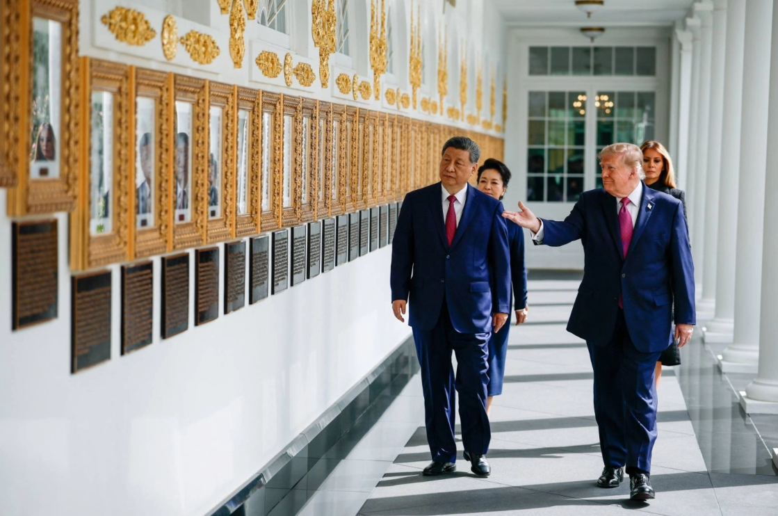 U.S. President Donald Trump, first lady Melania Trump, Chinese leader Xi Jinping and his wife, Peng Liyuan, walk along the Colonnade of the White House in Washington, Sept 24, 2026. (REUTERS)