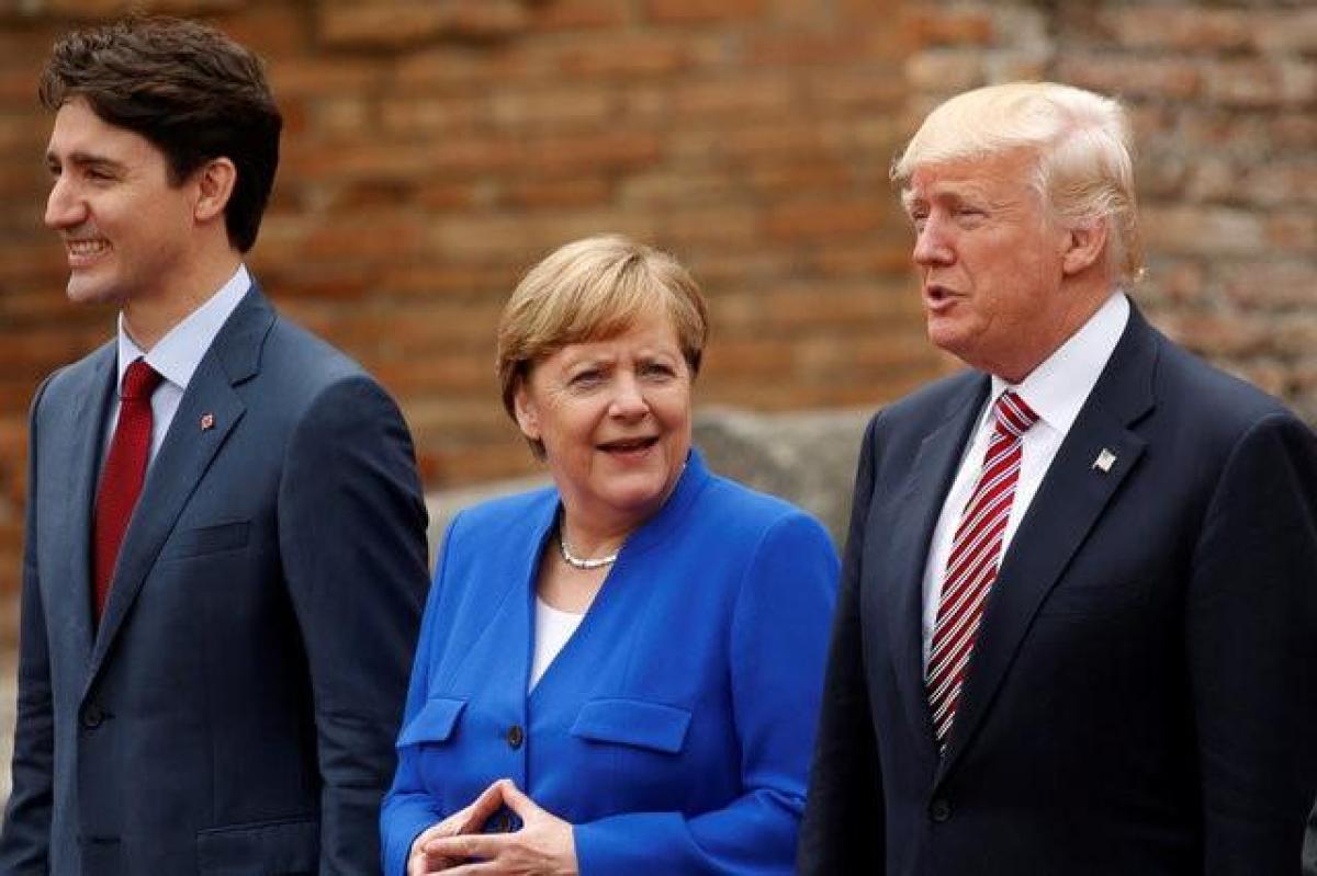 file-photo-u-s-president-donald-trump-german-chancellor-angela-merkel-canadian-prime-minister-justin-trudeau-pose-family-phto-greek-theatre-g7-summit-taormina-